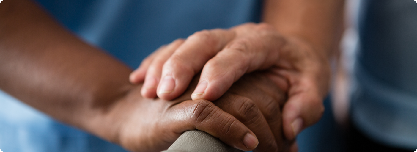hands of nurse and senior woman holding walker